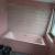 Pose carrelage lors d'une rénovation salle de bain avec le plombier VDK : guide complet